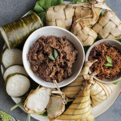 Raya buffet dinner with a variety of classic dish like ketupat, lemang, nasi impit and more