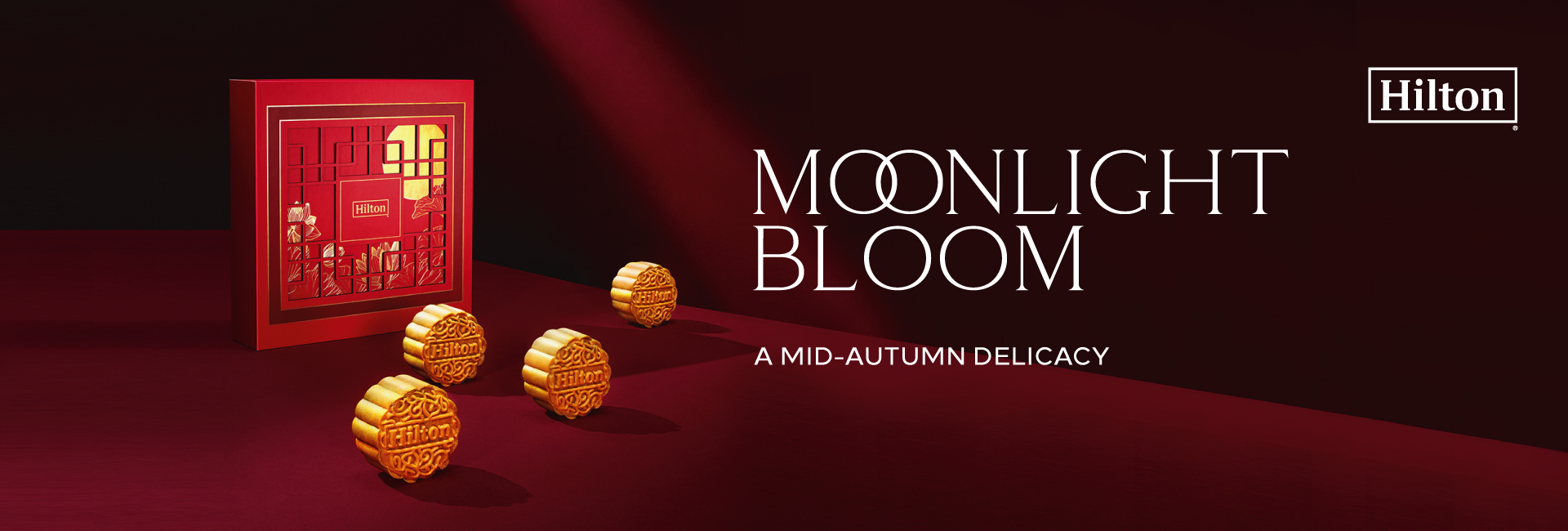 Hilton DoubleTree 2023 national mooncake box, image features a crimson red oriental box with a