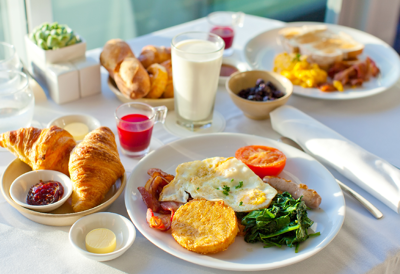 The photo shows a variety of breakfast dishes.