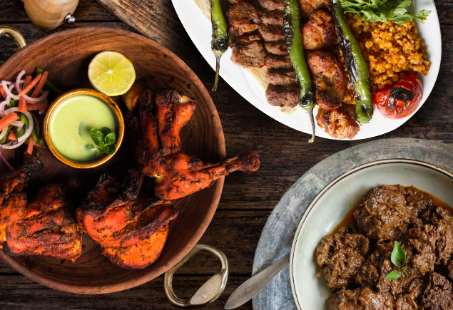 Three different types of dishes are presented on the table. From the left, Tandoori Lamb Chop, Beef Rendang and Shish Kebab.