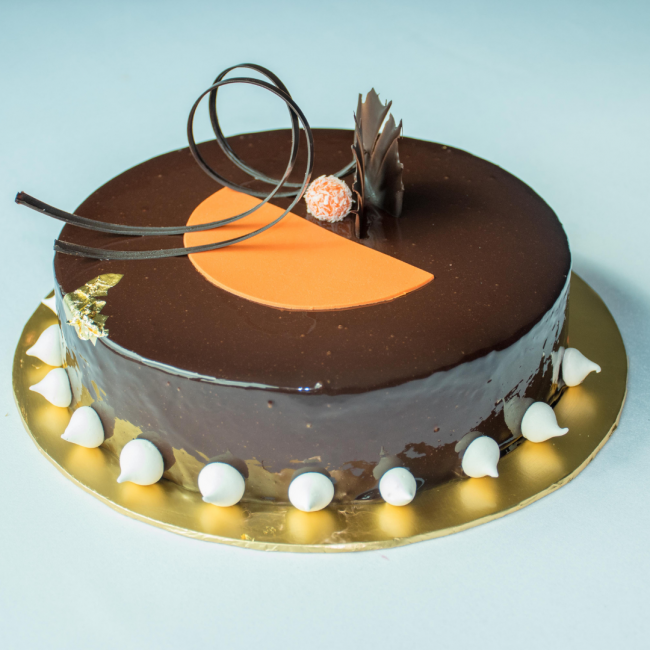A whole cake of Chocolate cake.