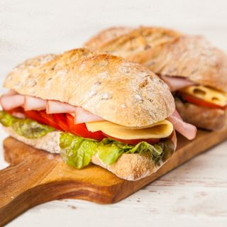 Two pieces of ham and cheese sandwich.