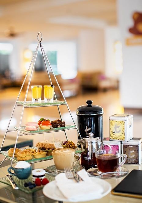 High Tea Set with a cup of coffee or tea on the table