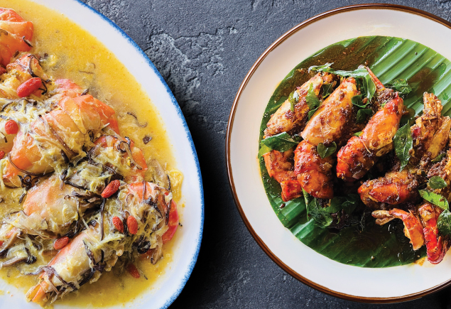 A plate of pen-fried cantonese style prawns and kam heong prawns with curry leaves