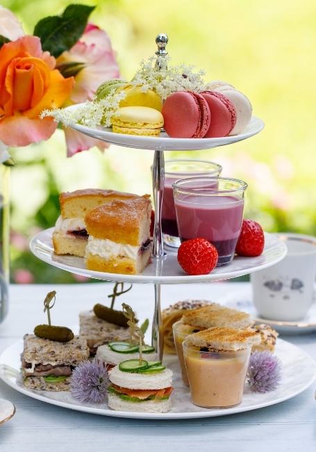 A high tea set with cakes and pasties