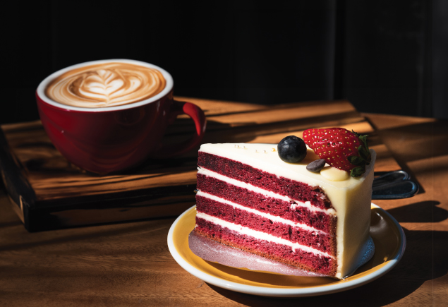 a cup of coffee and a slice of cake