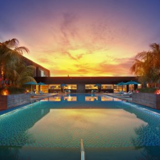 Hilton Kota Kinabalu's rooftop pool with beautiful sunset as a backdrop