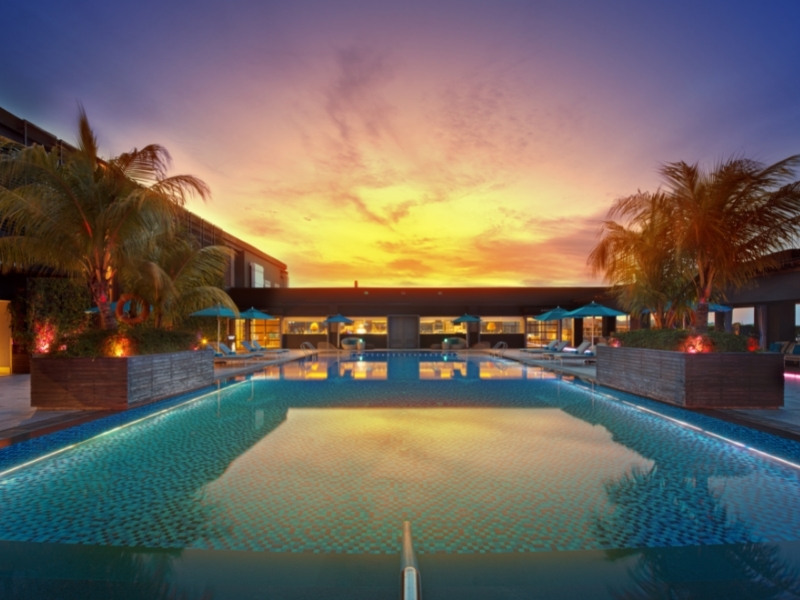 Hilton Kota Kinabalu's rooftop pool with beautiful sunset as a backdrop