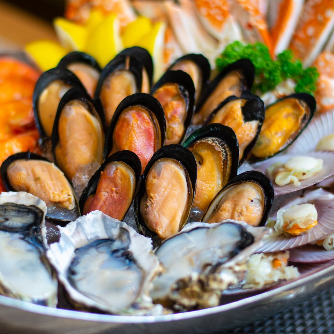 The photo shows a close-up photo of fresh seafood.