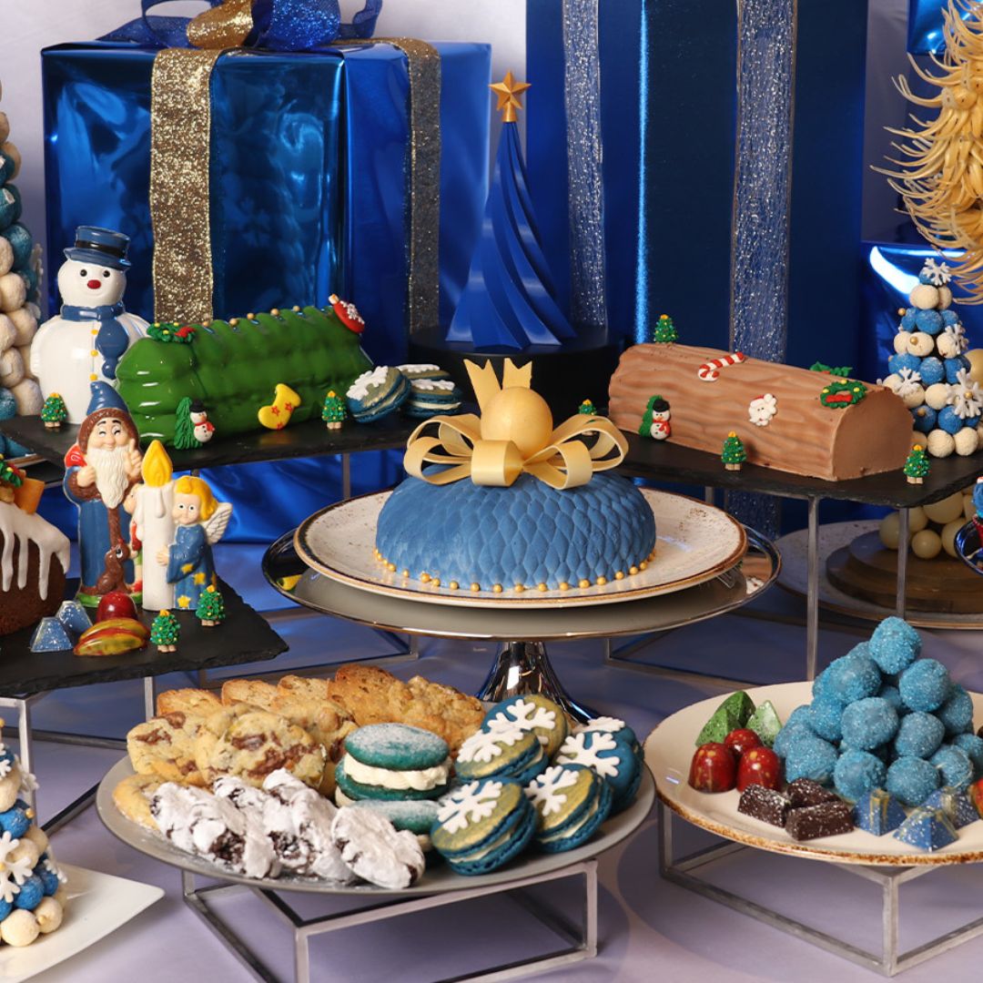 A variety of blue Christmas desserts.