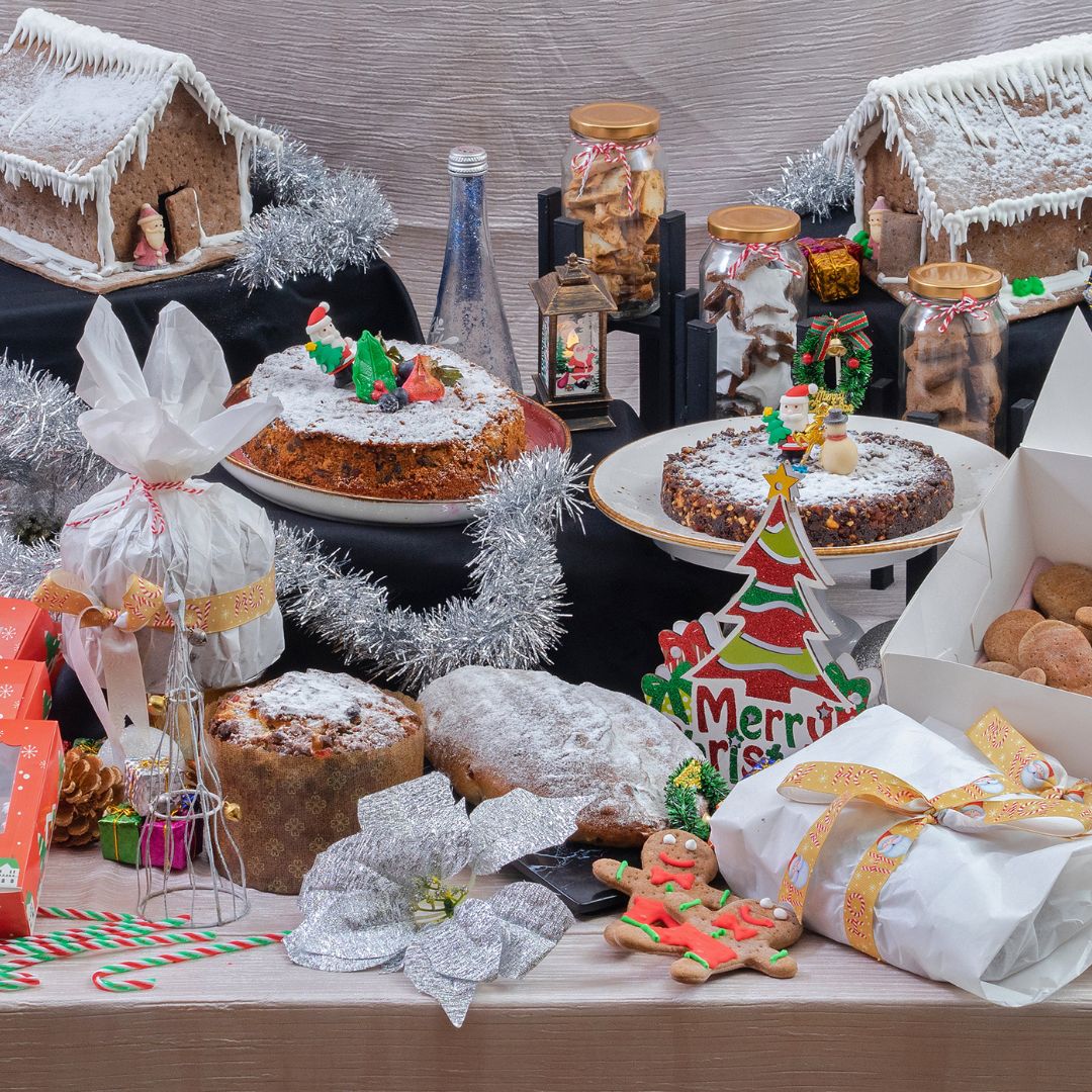 A variety of festive goodies such as cakes and biscuits.