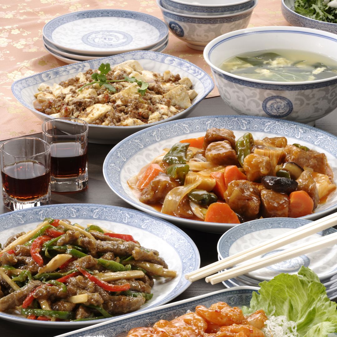Five different Chinese dishes on the table.
