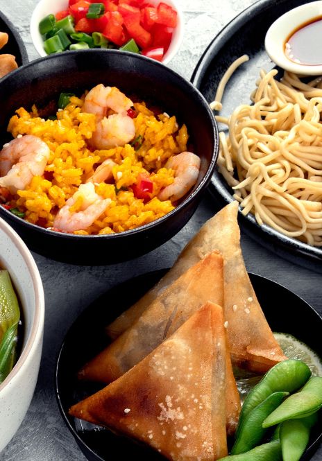 Prawn fried rice, samosa and dry noodle.