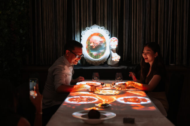 a couple dining and mesmerized at the banquet of hoshena hilton kuala lumpur